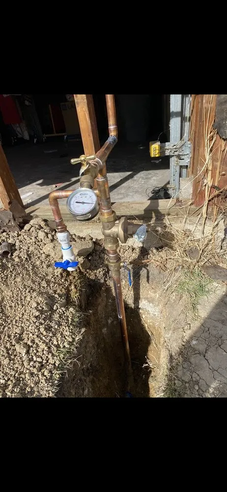 Slide of Mac’s Plumbing