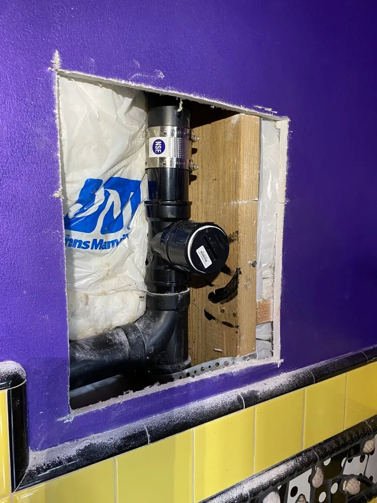 Slide of Mac’s Plumbing