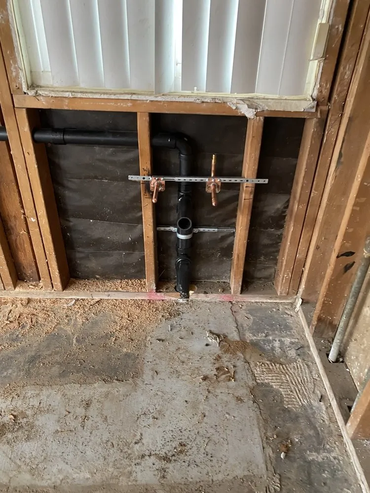 Slide of Mac’s Plumbing