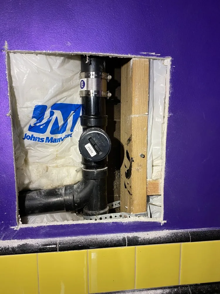 Slide of Mac’s Plumbing