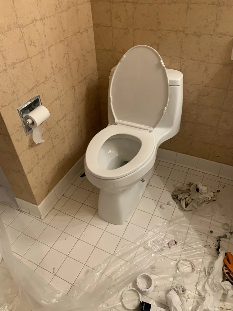 Slide of Mac's Plumbing