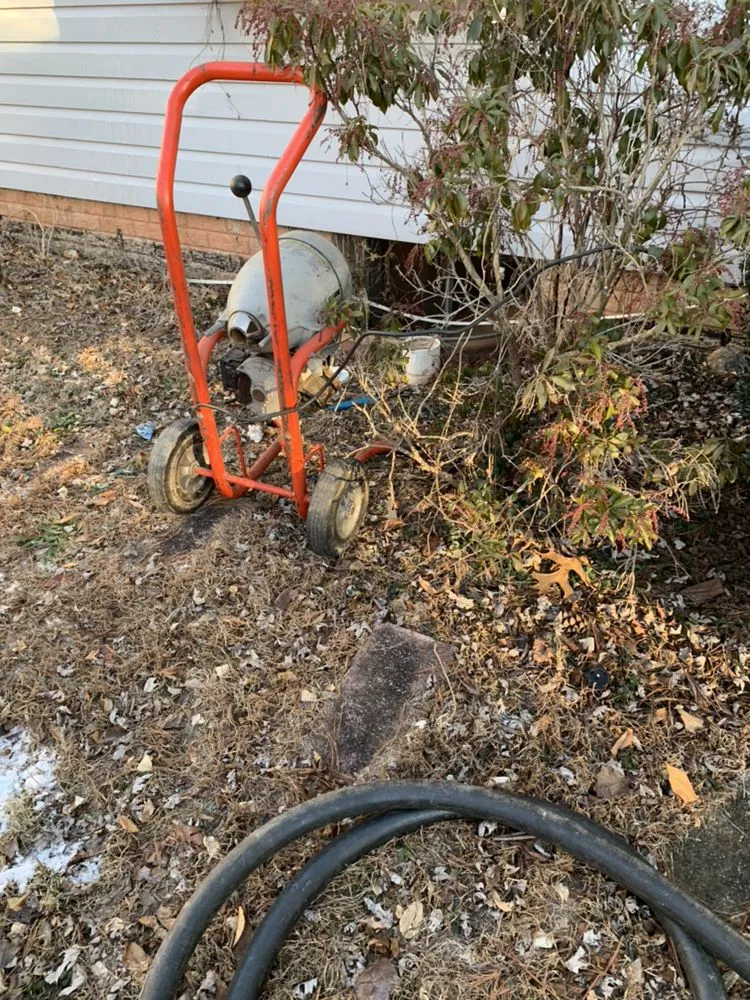 Slide of Mac's Plumbing