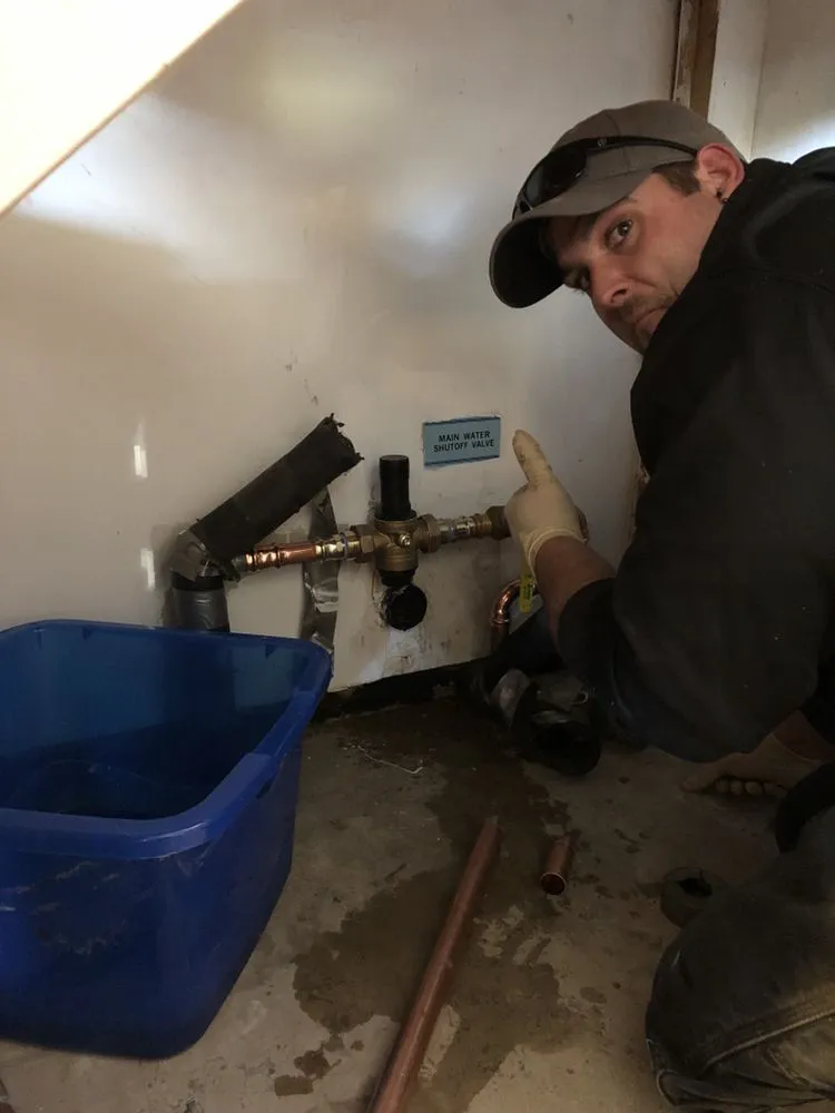 Slide of Mad Pipers Plumbing