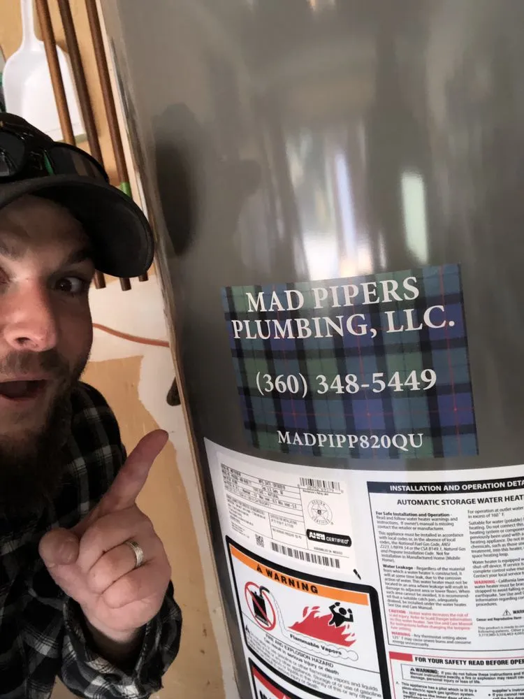 Slide of Mad Pipers Plumbing