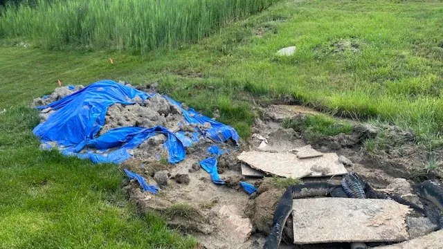 Slide of Main Drain Sewer & Repair