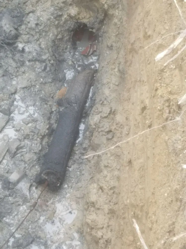 Slide of Main Drain Sewer & Repair