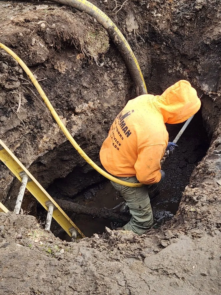 Slide of Main Man Water Main & Sewer Service