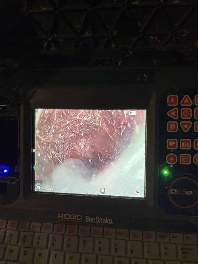 Slide of Maine Drain Busters