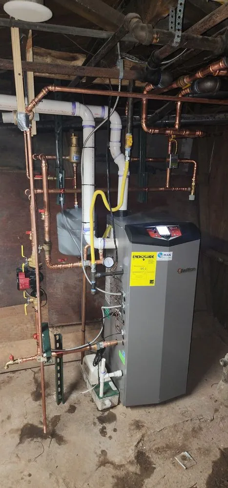 Slide of Man Plumbing & Heating