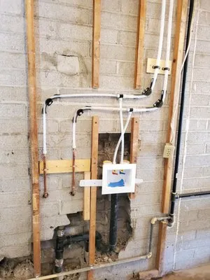 Marco's Tankless Logo