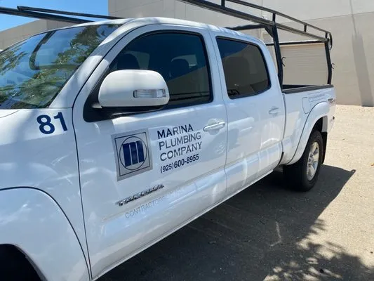 Marina Plumbing Company Logo