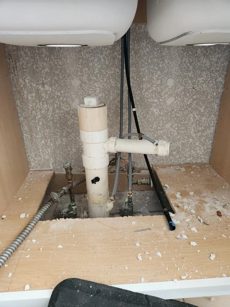 Slide of Mario's Drain Clearing and Water Treatment Services