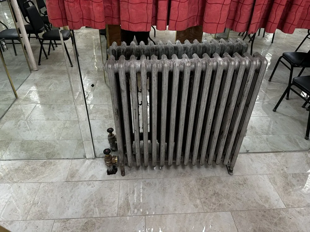 Slide of Mario's Plumbing and Heating