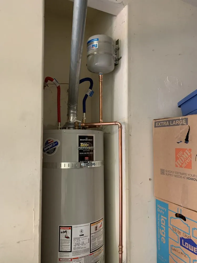 Slide of Martins Drain Cleaning