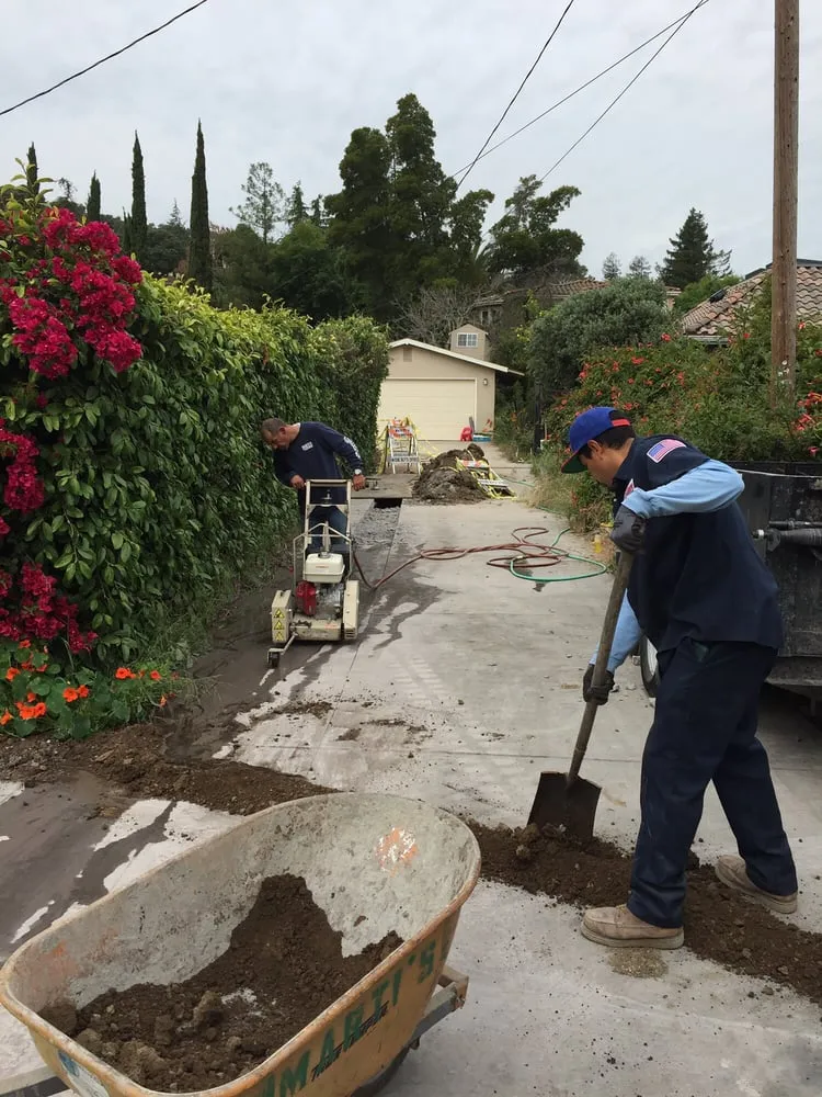 Slide of Marti’s Plumbing Service