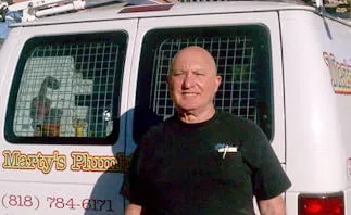 Marty's Plumbing Company Logo