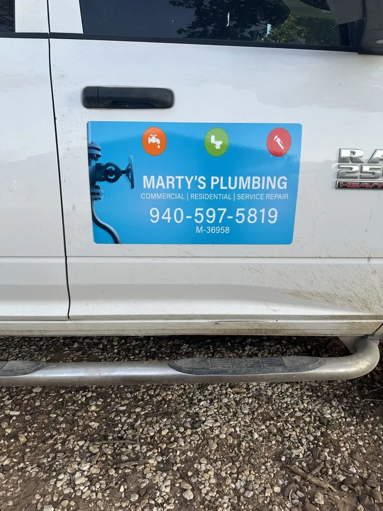 Slide of Marty's Plumbing