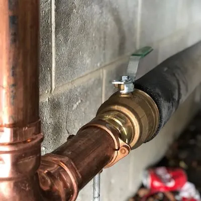 Maxwell's Plumbing and Drain Logo