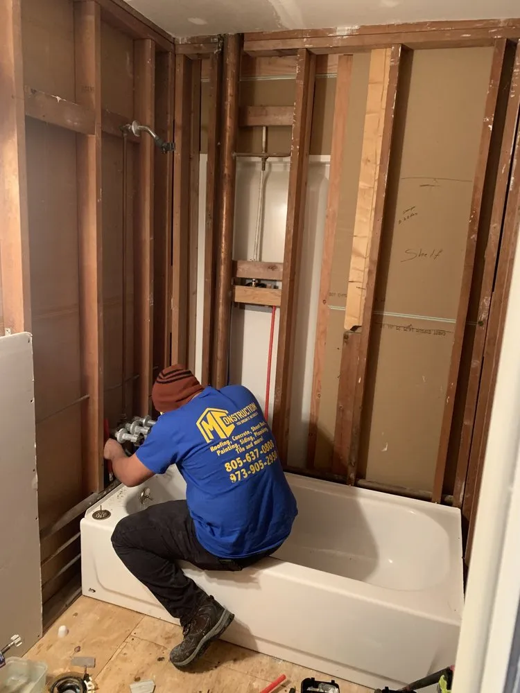 Slide of MC Construction & Remodeling