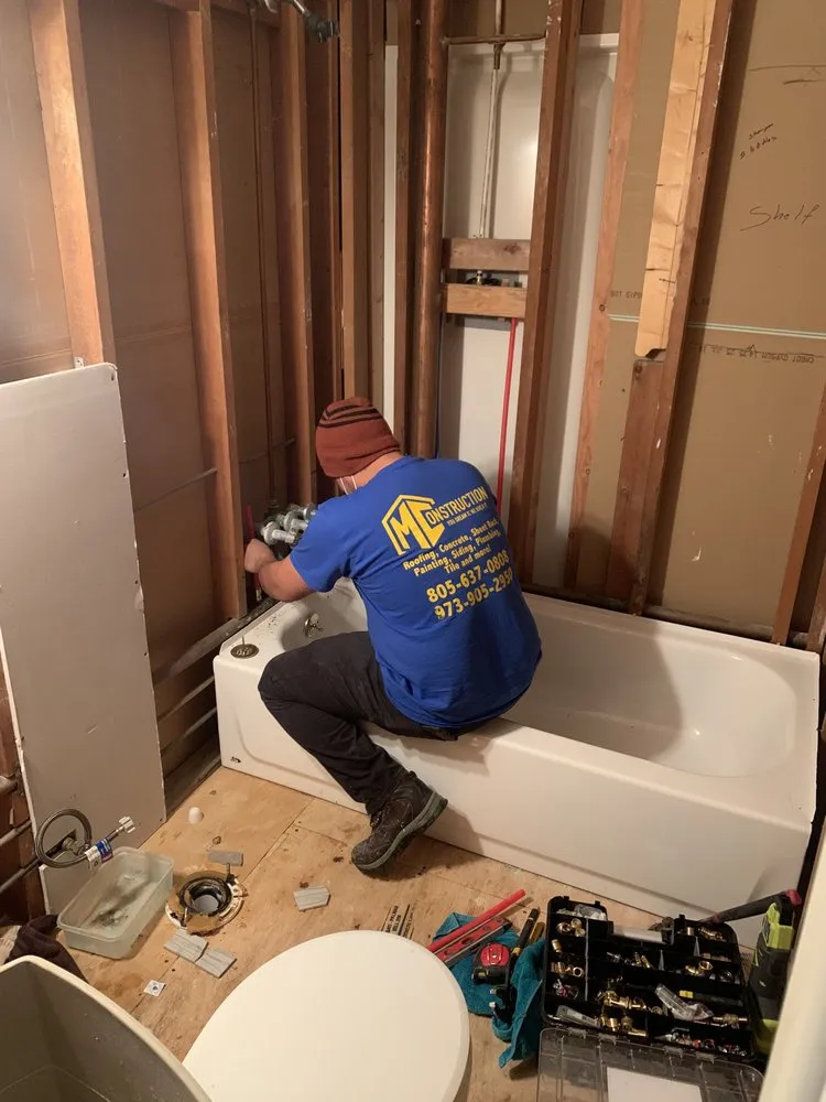 Slide of MC Construction & Remodeling