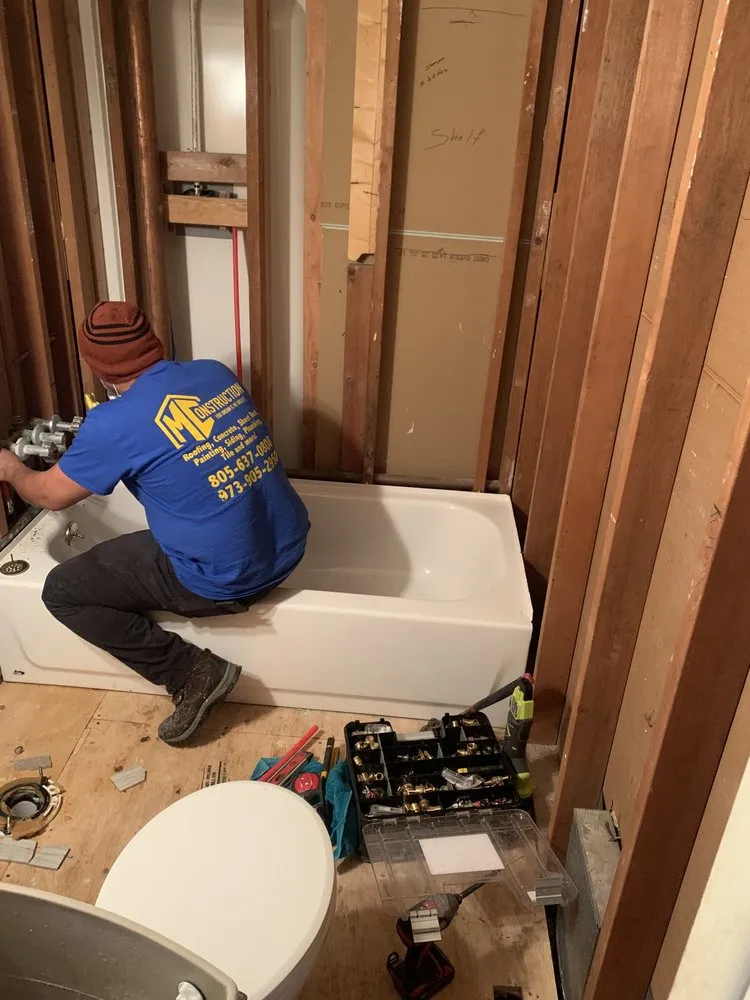 Slide of MC Construction & Remodeling