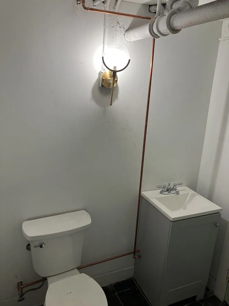 Slide of M&C Plumbing