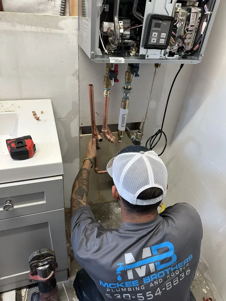 Slide of McKee Brothers Plumbing and Rooter