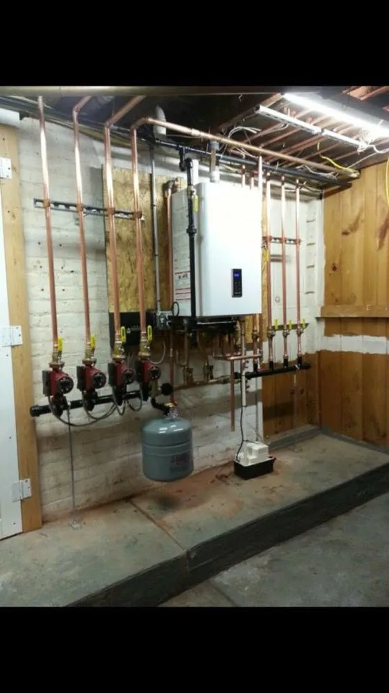 Quality water heater service for homes in Port Jefferson, NY by MD Plumbing & Heating