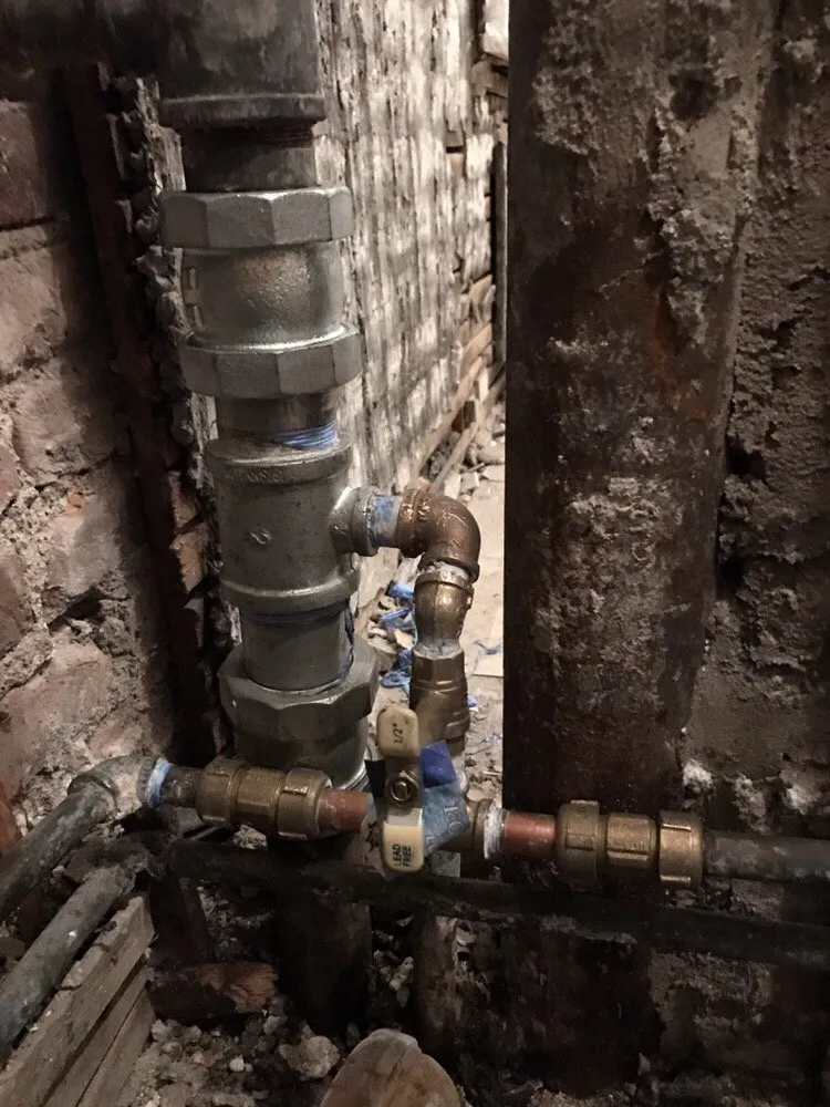 Slide of Me Plumbing & Heating Services