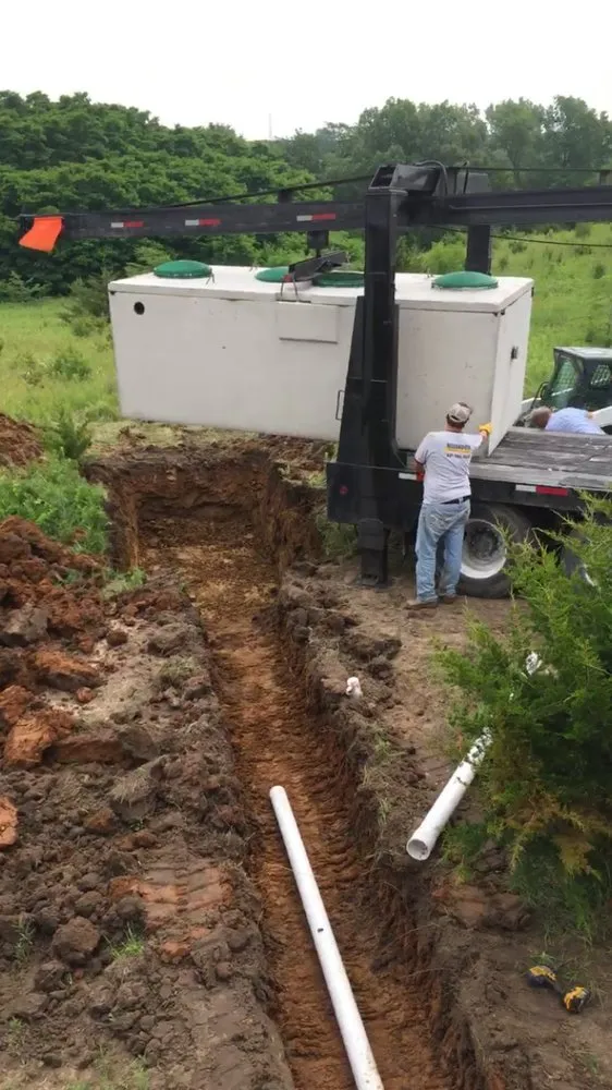 Slide of Meland Co. Septic Service & Excavating