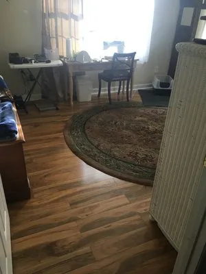 Mels Remodeling Logo