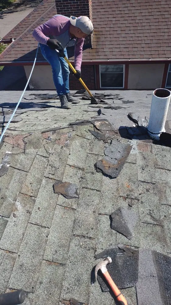 Slide of Menny Roofing