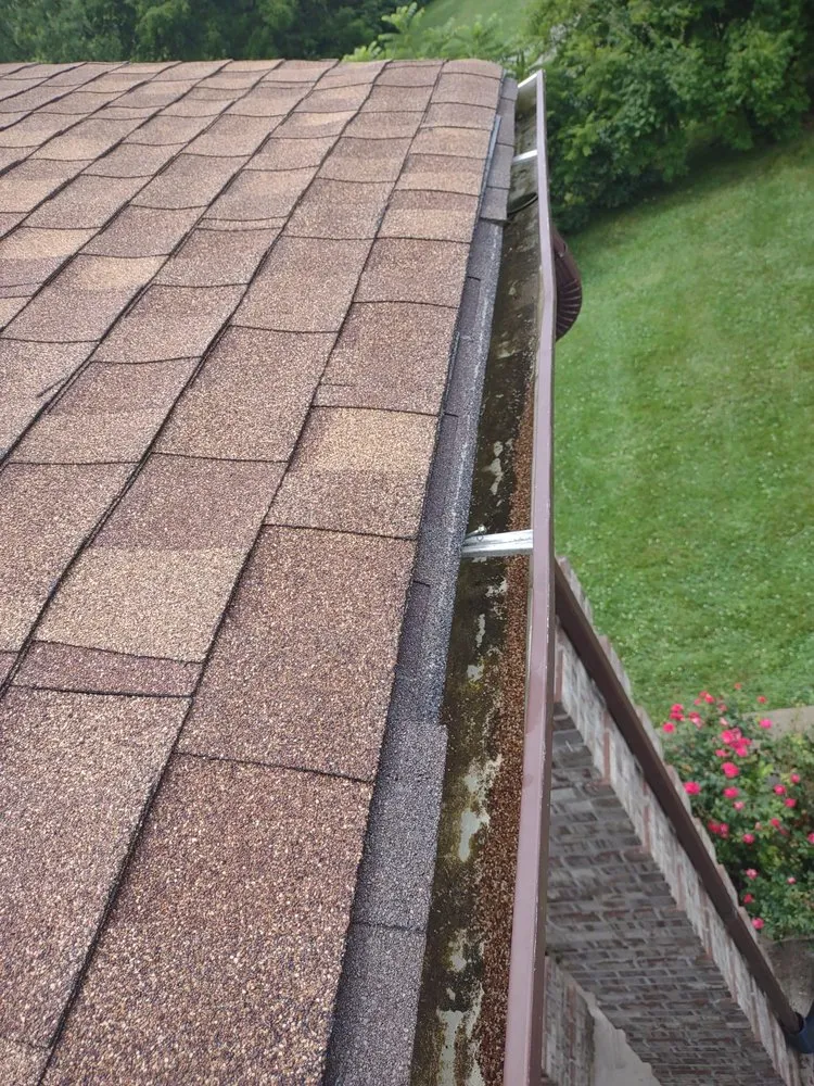 Slide of Menny Roofing