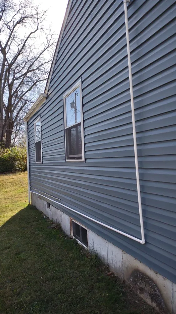 Slide of Menny Roofing