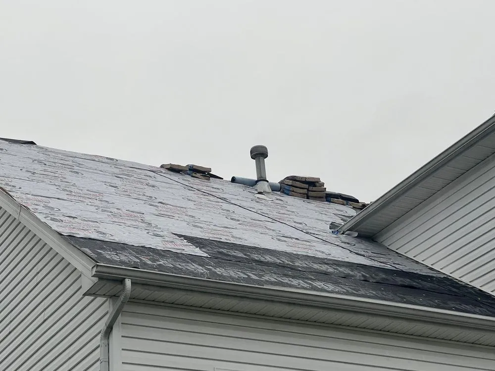 Slide of Menny Roofing