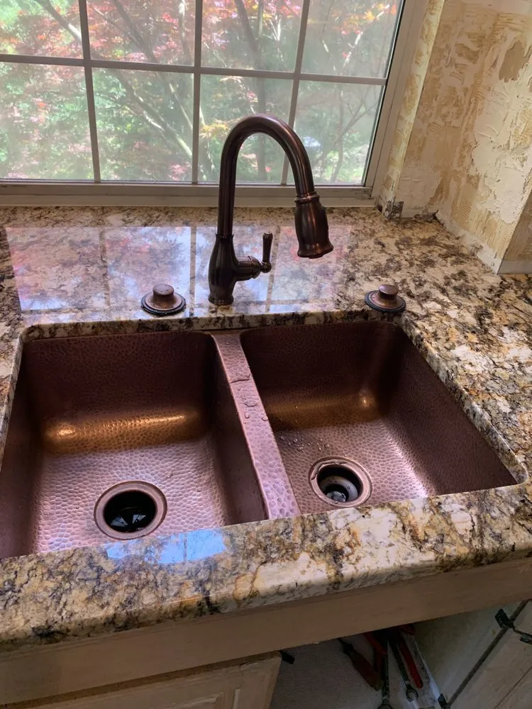 Slide of Mercer Experts Plumber