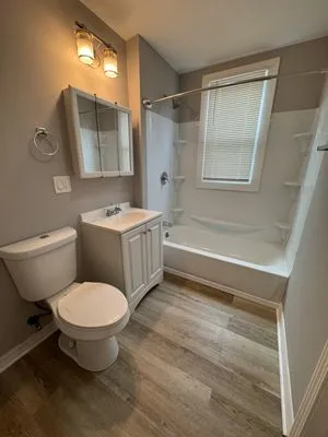 Merlins Maintenance Logo