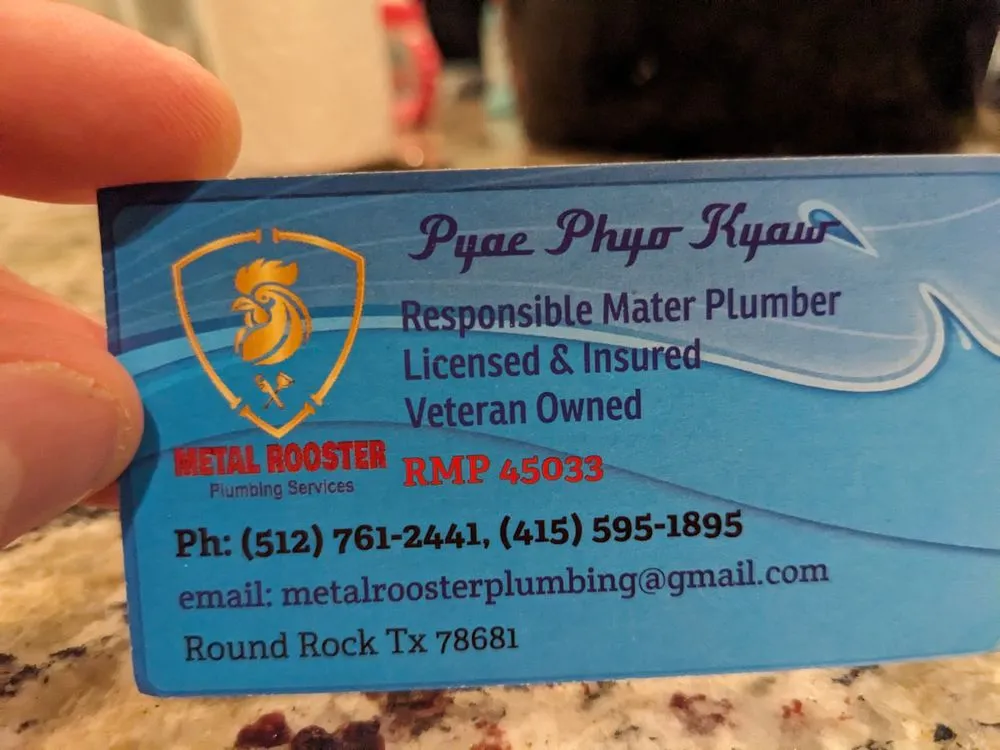 Slide of Metal Rooster Plumbing