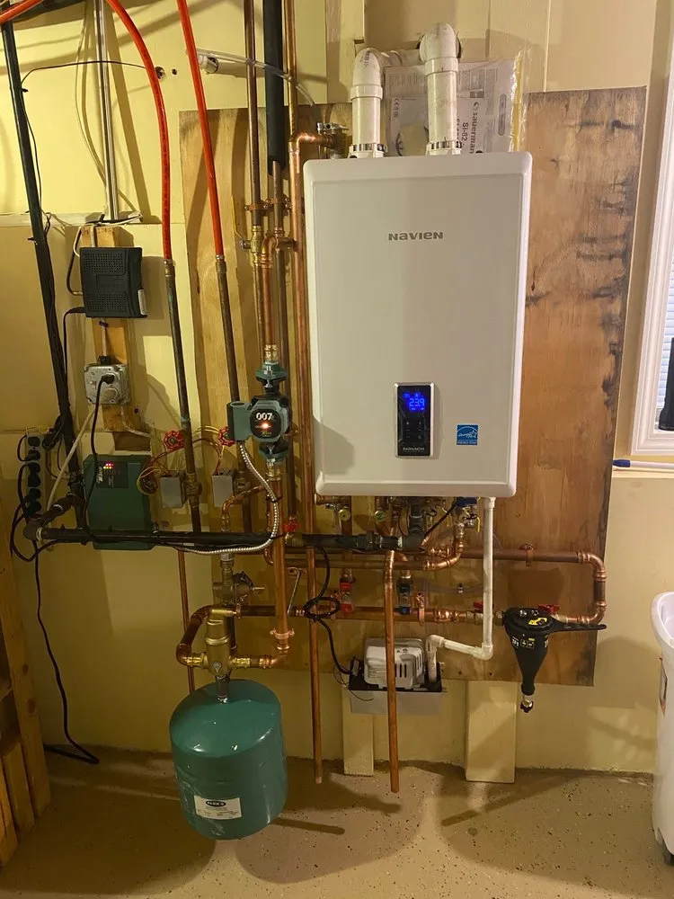 Slide of MF Mitchell Plumbing HVAC & Drain Cleaning