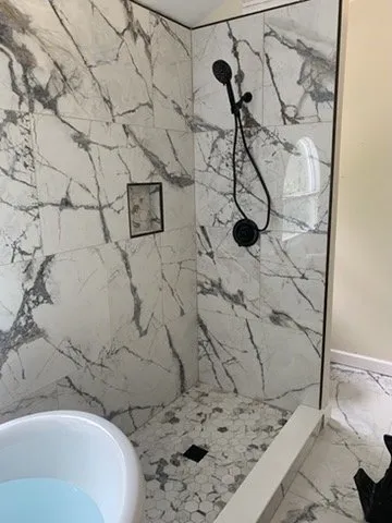 Slide of MGK Plumbing