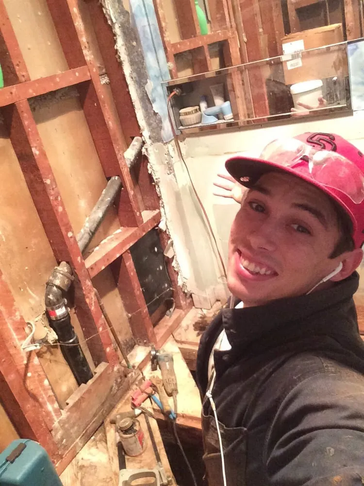 Slide of Michael's Drains and Water heaters