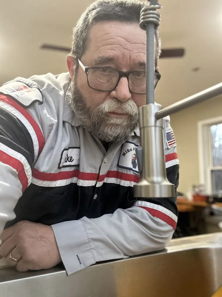 Slide of Mike the Plumber