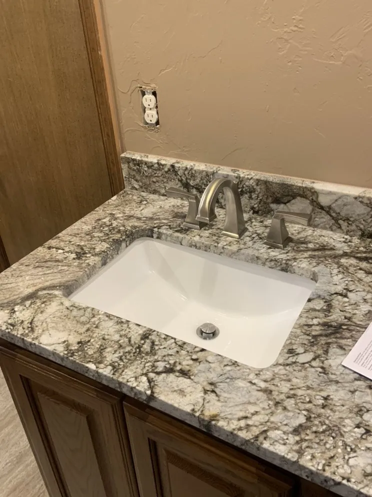 Slide of Mike's Faucet & Fixture