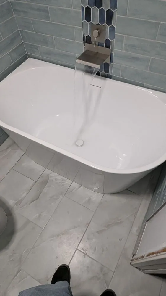 Slide of Mike's Plumbing and Rooter