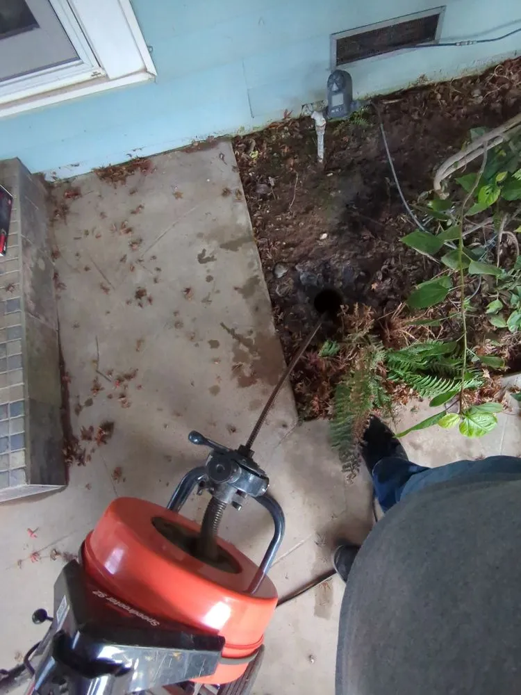 Slide of Mike's Plumbing and Rooter