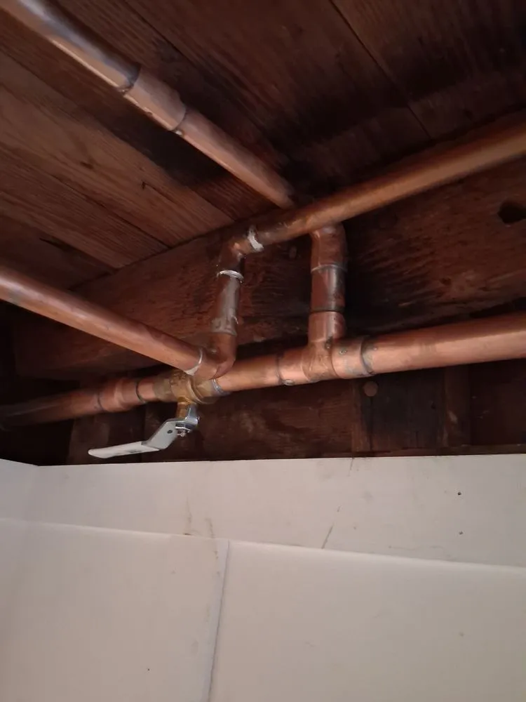 Slide of Mike's Plumbing and Rooter