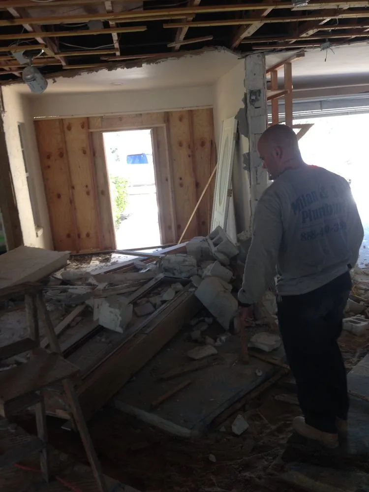 Slide of Milan and Son Plumbing