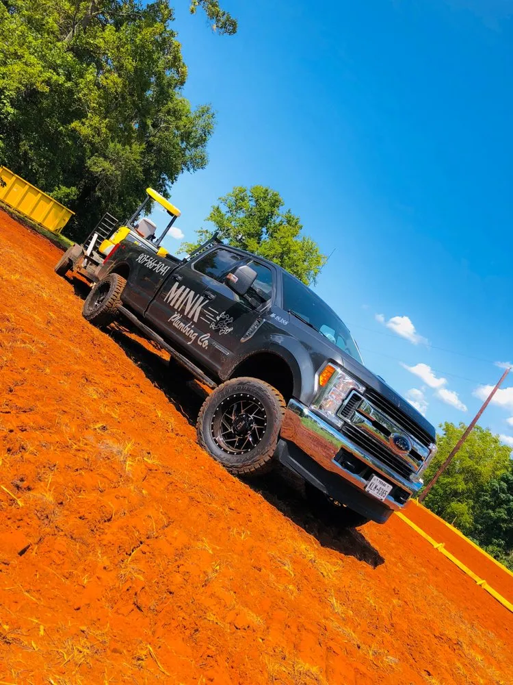 Slide of Mink Plumbing