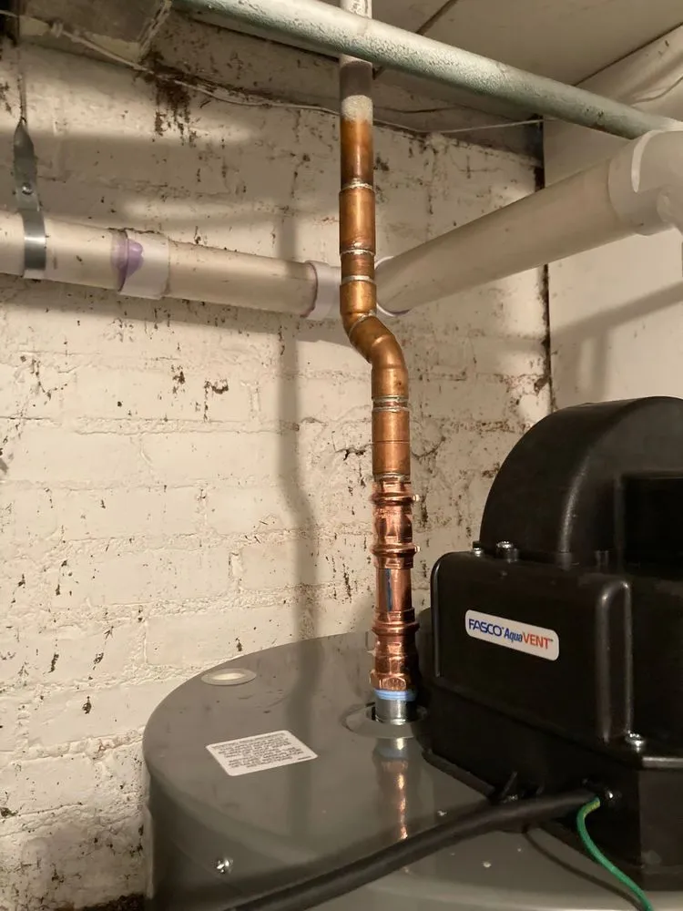 Slide of Minuteman Plumbing Heating & Cooling