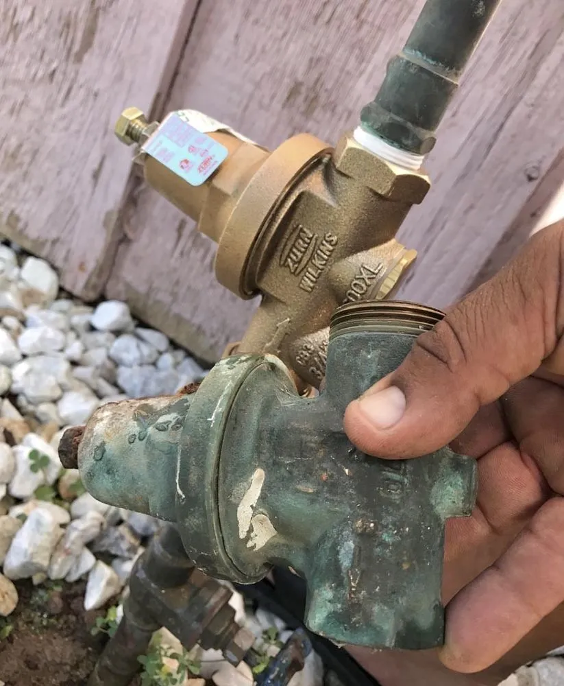 Slide of Miranda’s Attentive Rooter Service